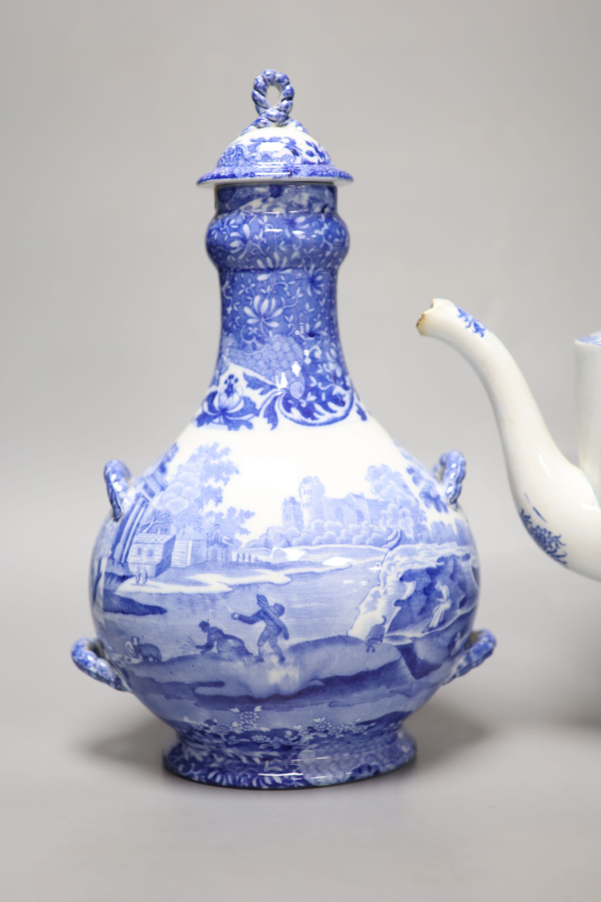 A Staffordshire pearlware blue and white pottery coffee pot and a Copeland Spode pilgrim flask, tallest 31cm